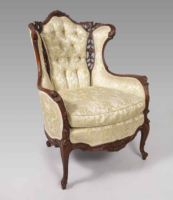 Appraisal: FRENCH CARVED TALL BACK BERGERE CHAIR The arched crest centering