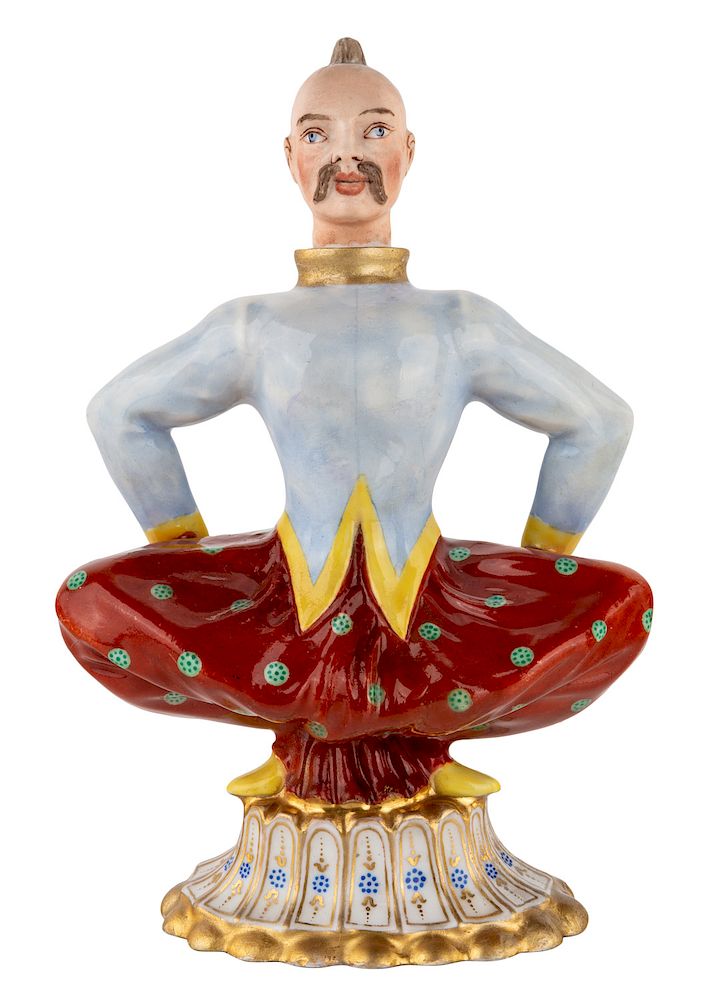 Appraisal: A RUSSIAN PORCELAIN PERFUME BOTTLE IN THE FORM OF MONGOLIAN