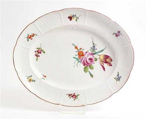 Appraisal: FLORAL DECORATED OVAL PLATTER Ludwigsburg circa Weave pattern edge Painted