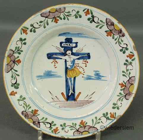 Appraisal: Delft plate th c depicting the Crucifixion of Christ Ex-Collection