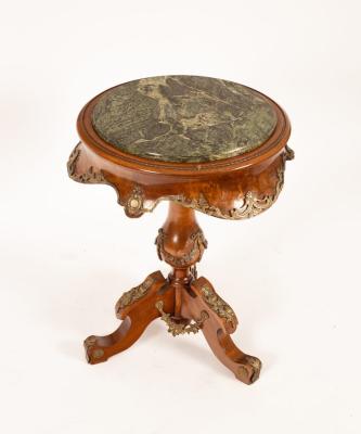 Appraisal: A Continental walnut and brass mounted tripod table with green