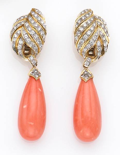 Appraisal: each pendant earring featuring a drop-shaped piece of coral measuring