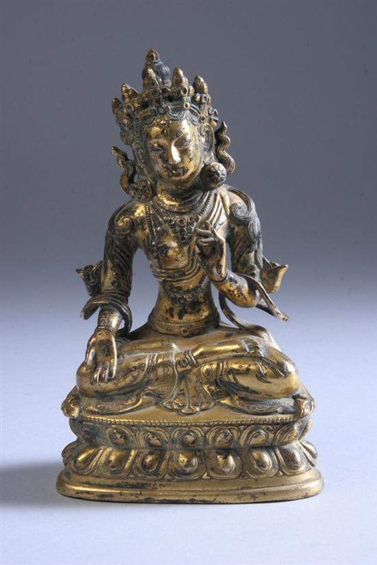 Appraisal: SINO-TIBETAN GILT BRONZE DEITY th century or later Seated on