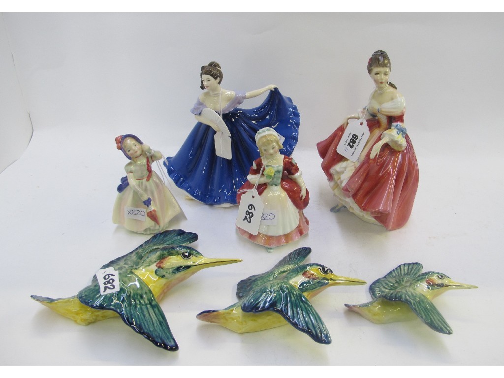 Appraisal: Four Doulton figures including Southern Belle HN Elaine HN Babie