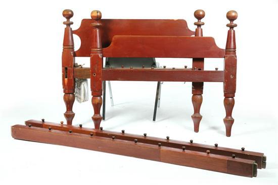 Appraisal: TWO TWIN CANNONBALL ROPE BEDS Stained red with turned posts