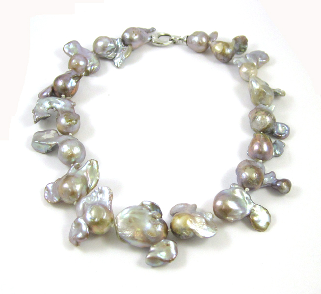 Appraisal: PRINCESS LENGTH PINK BAROQUE PEARL NECKLACE measuring inches in length