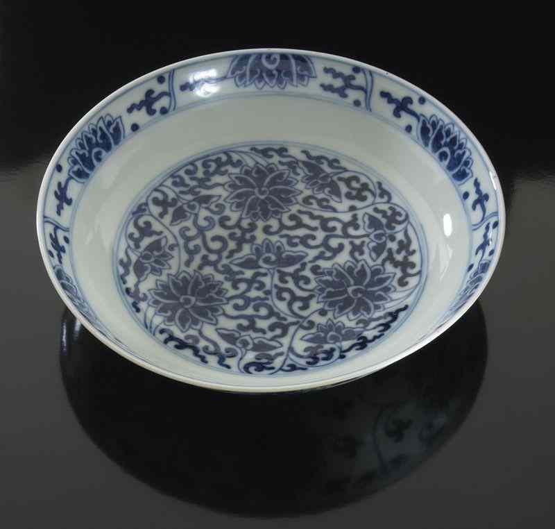 Appraisal: Chinese Qing Tongzhi Imperial blue and whiteporcelain dish depicting lotus