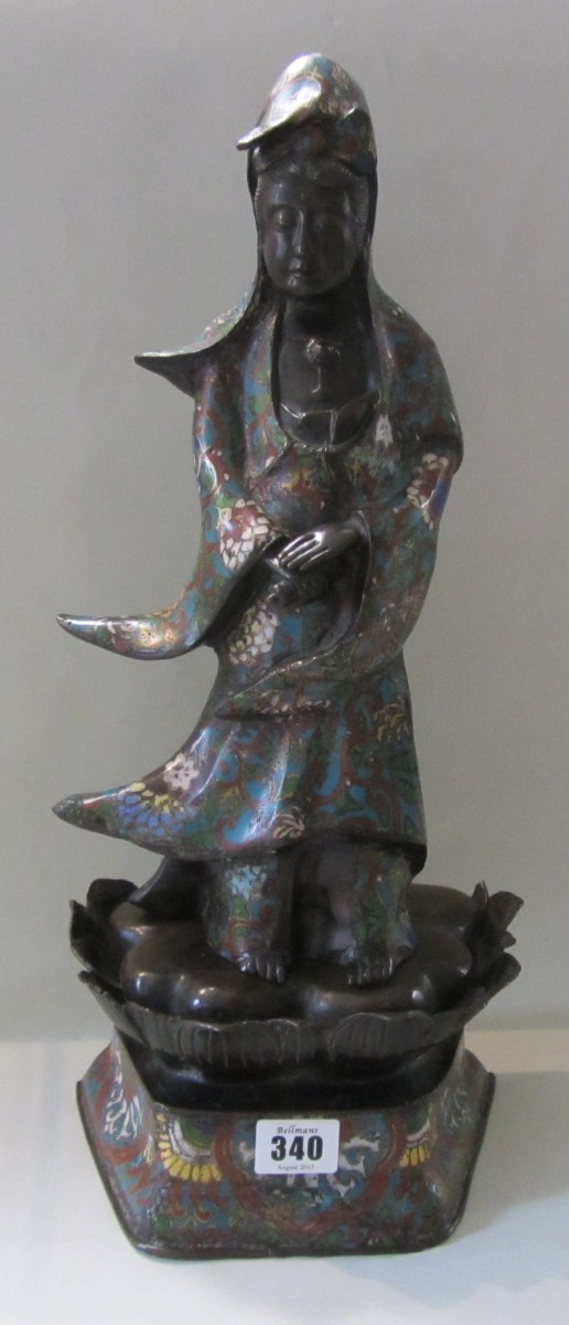 Appraisal: A Japanese bronze and champlev enamel figure of Kannon late