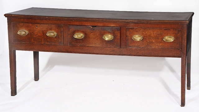 Appraisal: A GEORGE III OAK AND MAHOGANY DRESSER BASE with rectangular