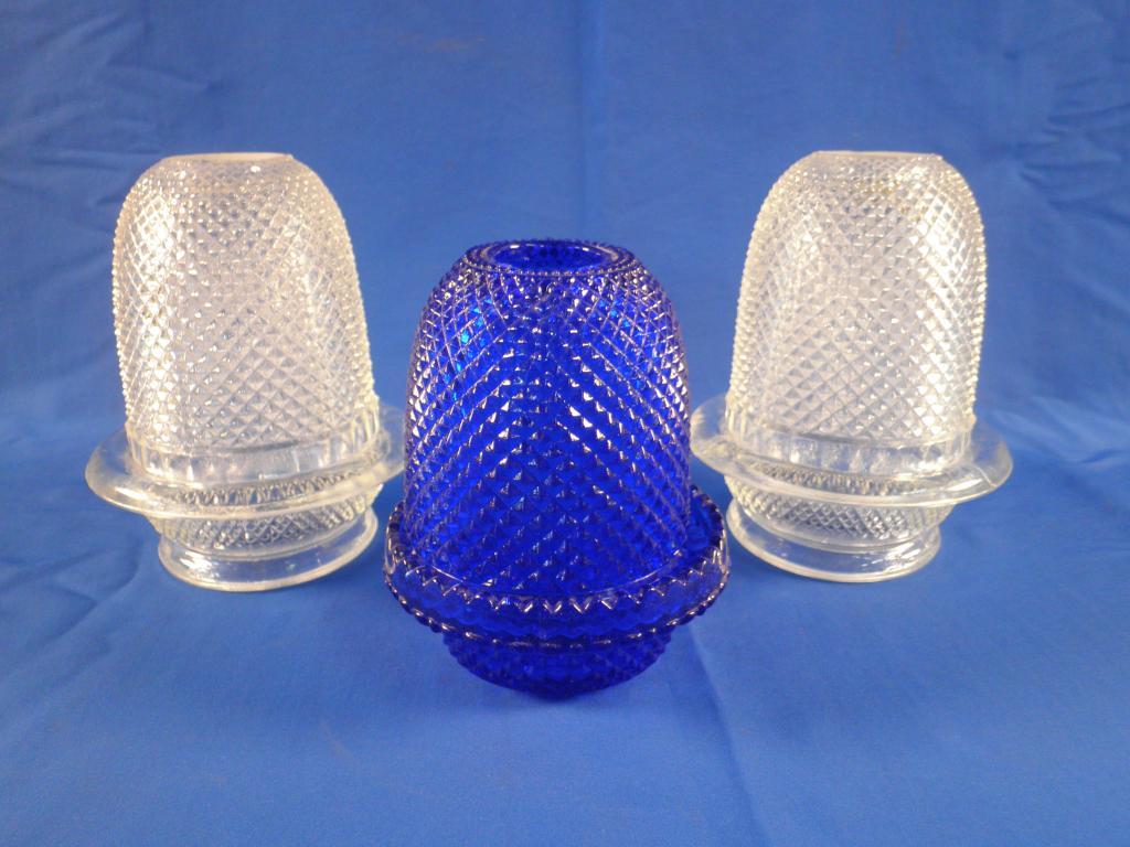 Appraisal: A pair of George Davidson clear moulded glass night lights