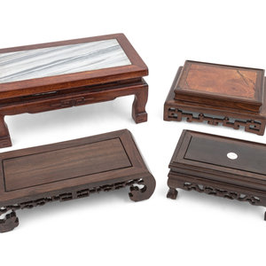 Appraisal: Four Chinese Hardwood Stands th th Century one inset with