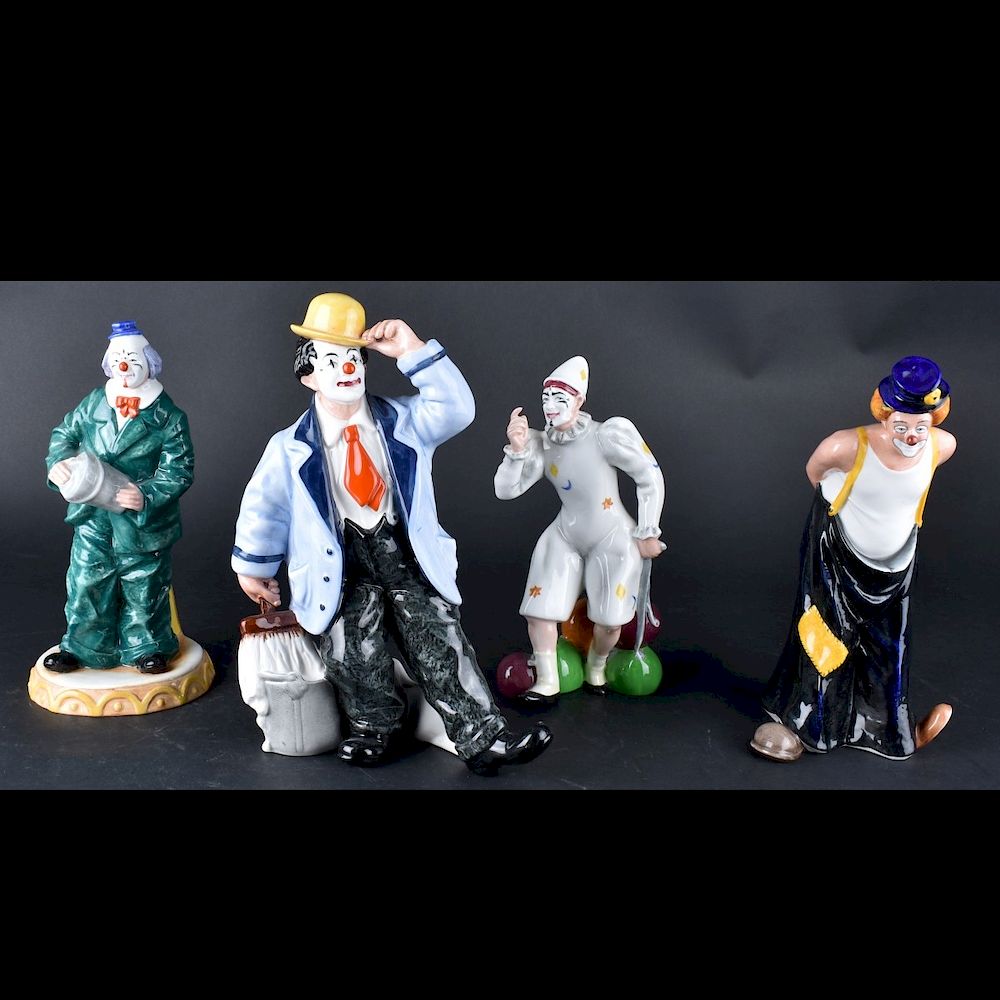 Appraisal: Four Royal Doulton Figurines Grouping of Four Royal Doulton Porcelain