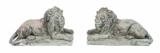 Appraisal: A Pair of Cast Bronze Lions th century having green