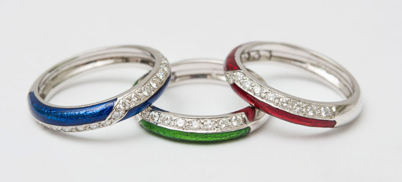 Appraisal: SET OF THREE K WHITE GOLD ENAMEL AND DIAMOND RINGS