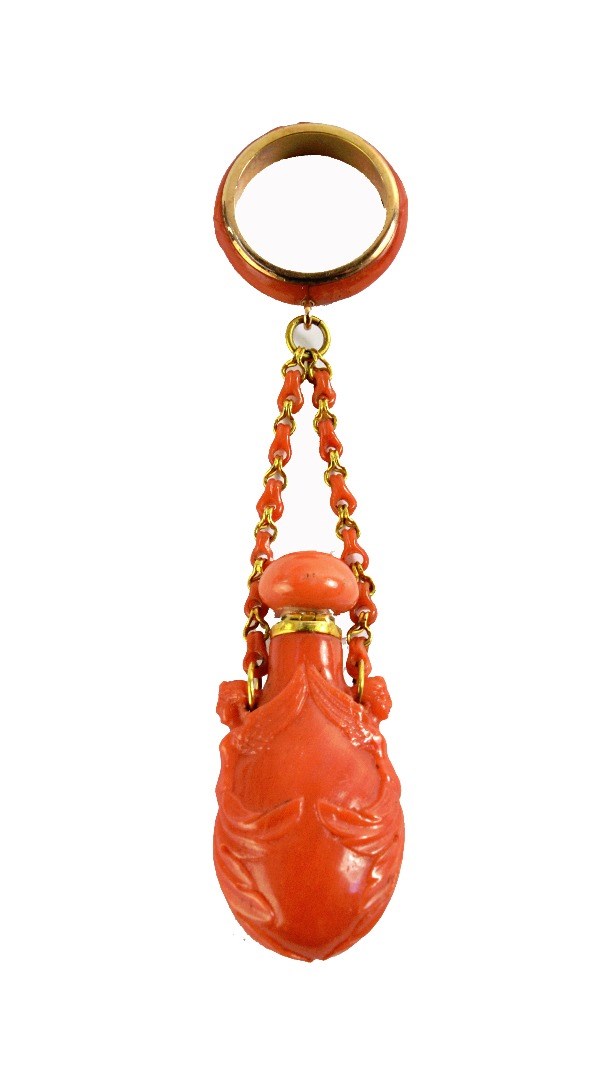 Appraisal: A carved coral drop shaped scent bottle first half of