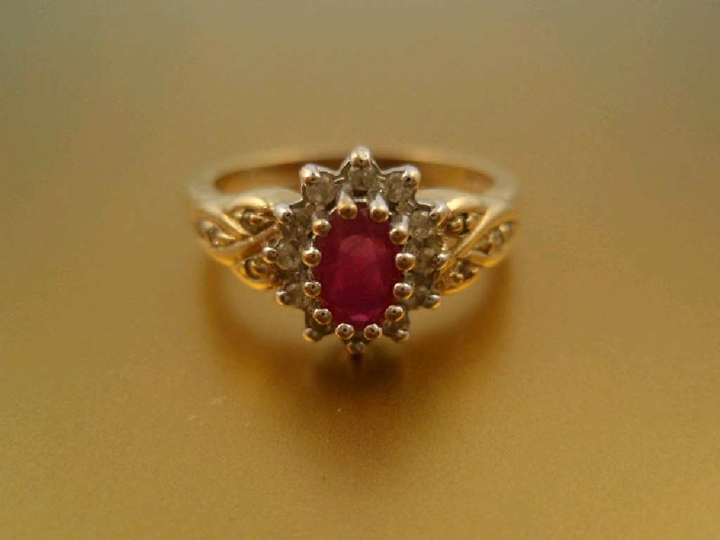 Appraisal: A red and white stone oval cluster ring yellow metal