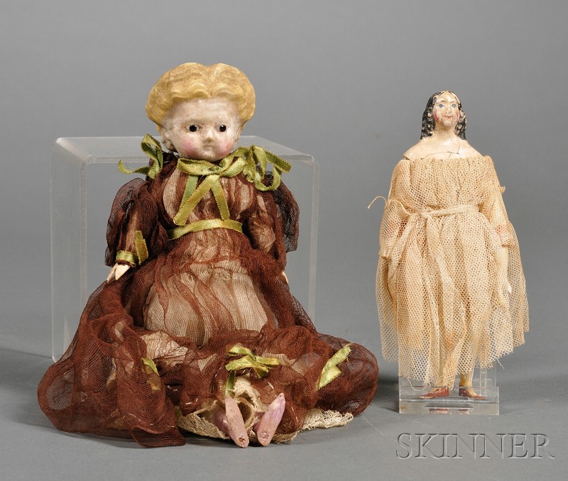 Appraisal: Two Small Early Dolls s- s molded papier-mache head with