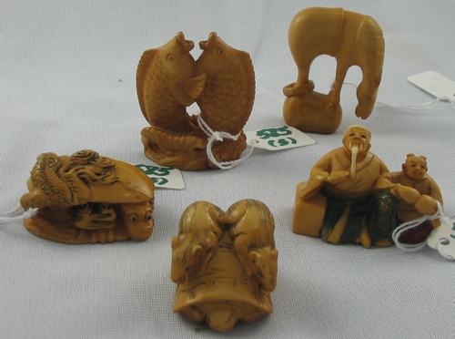 Appraisal: FIVE ASIAN NETSUKE carved and molded from a composite material