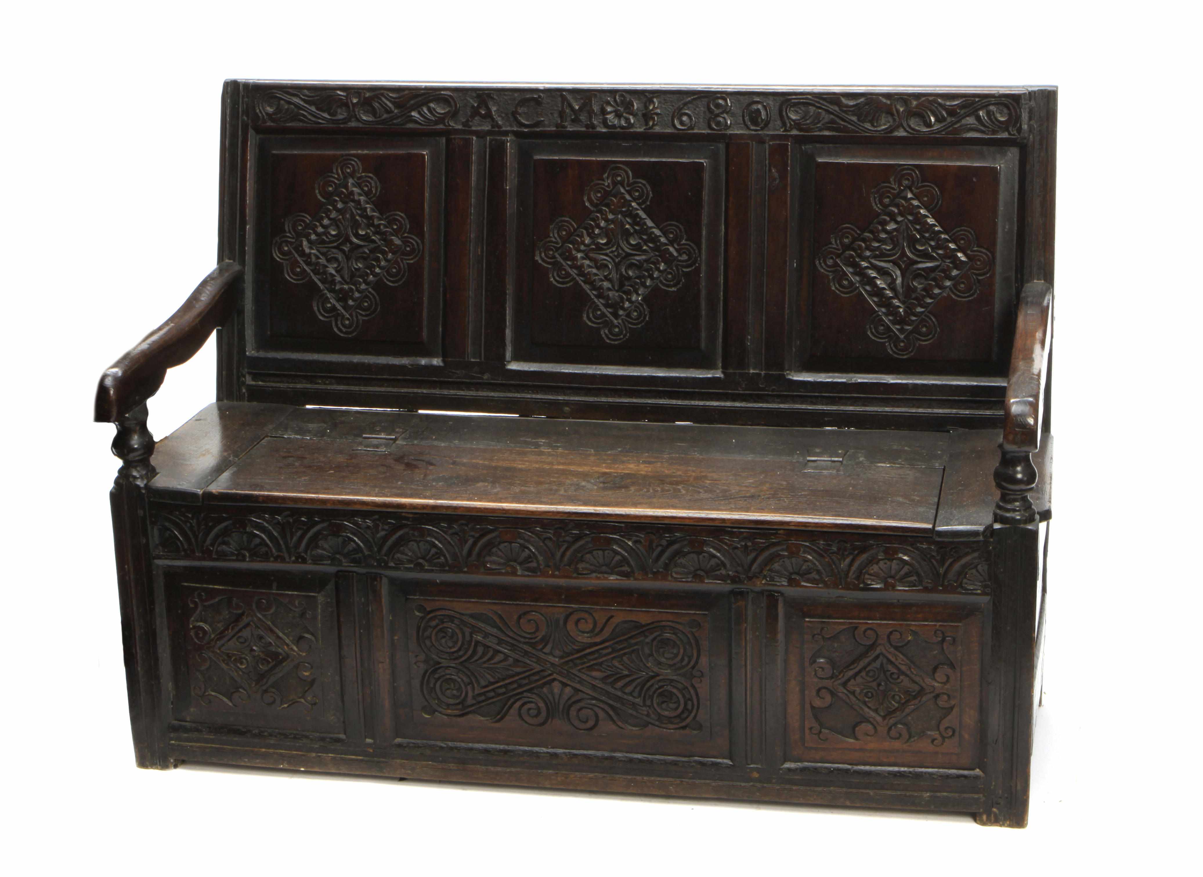 Appraisal: An English carved oak hall bench late th century with