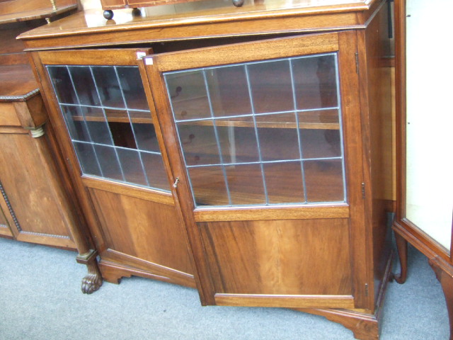 Appraisal: A th century mahogany side cabinet with a pair of