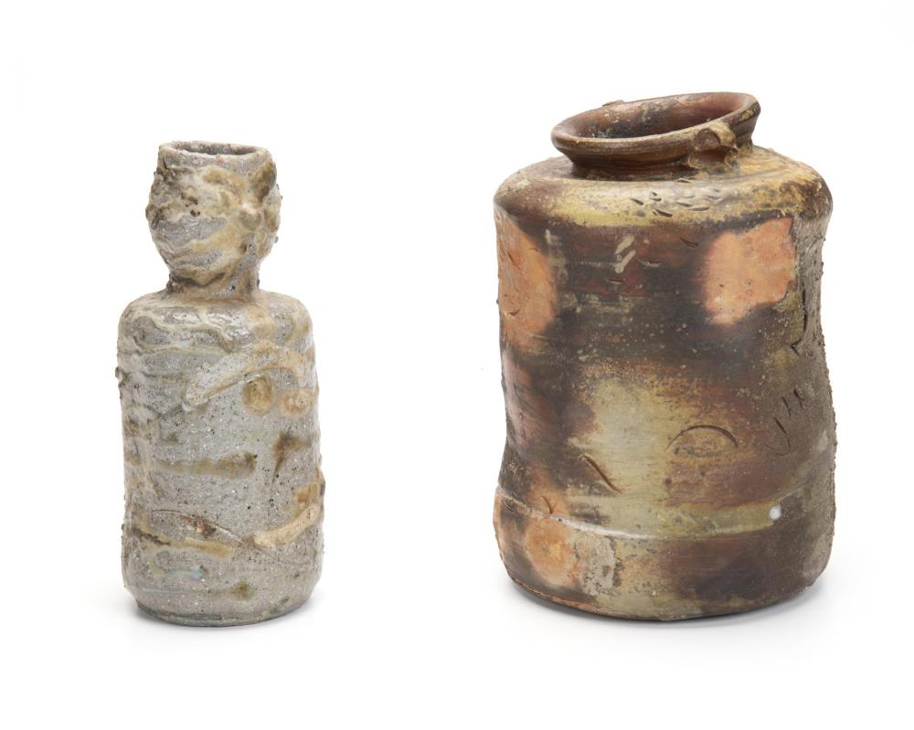 Appraisal: A Japanese jar and sake bottle th Century The jar