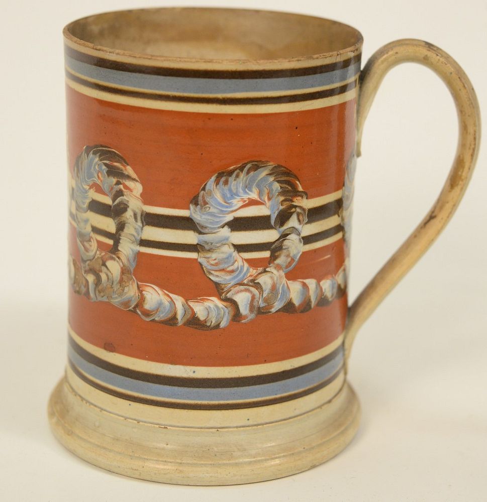 Appraisal: Large Mocha Footed Mug having banding and tri-color cable staining