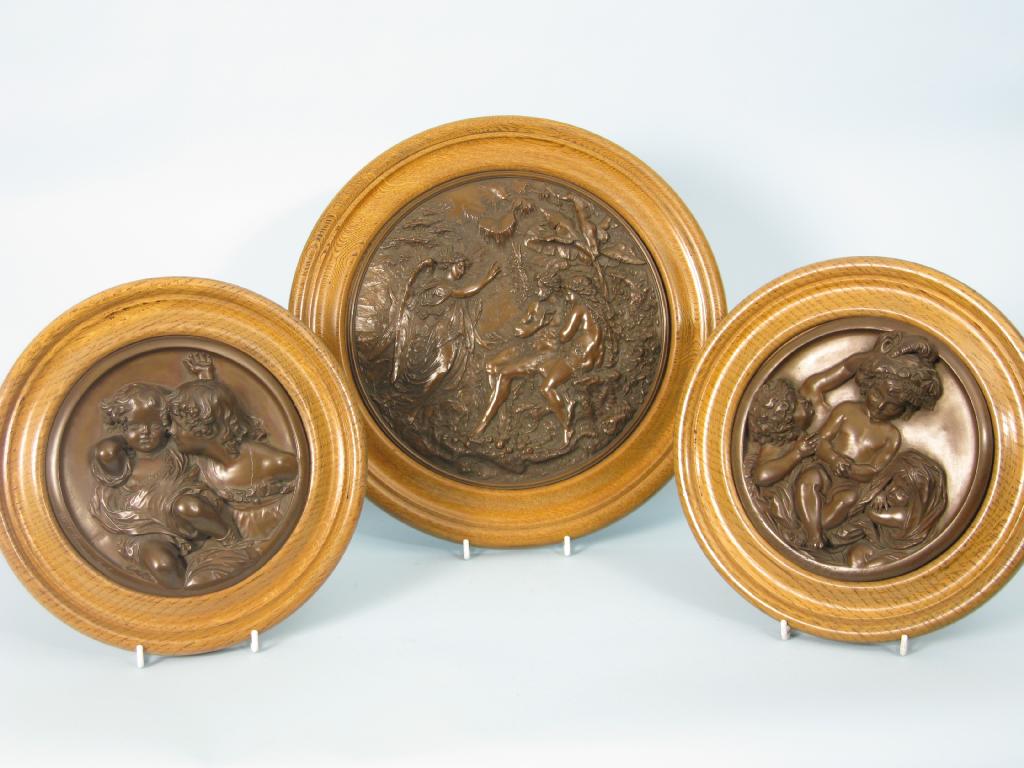 Appraisal: E W WYON Pair of bronzed Plaques of Art after