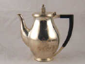 Appraisal: A silver chocolate pot with pineapple finial Birmingham wt gms