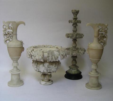 Appraisal: A PAIR OF ALABASTER EWERS in the classical style c