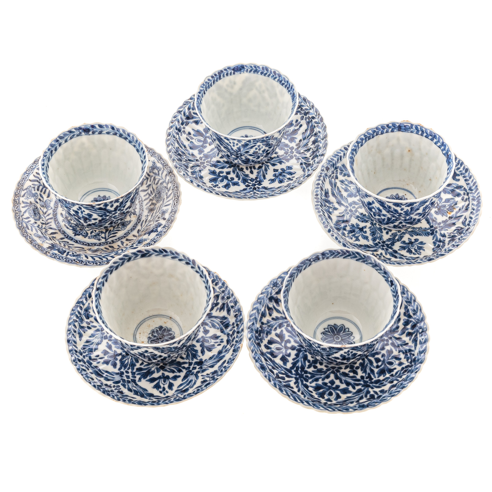 Appraisal: FIVE CHINESE EXPORT BLUE WHITE CUPS SAUCERS Kang Xi circa