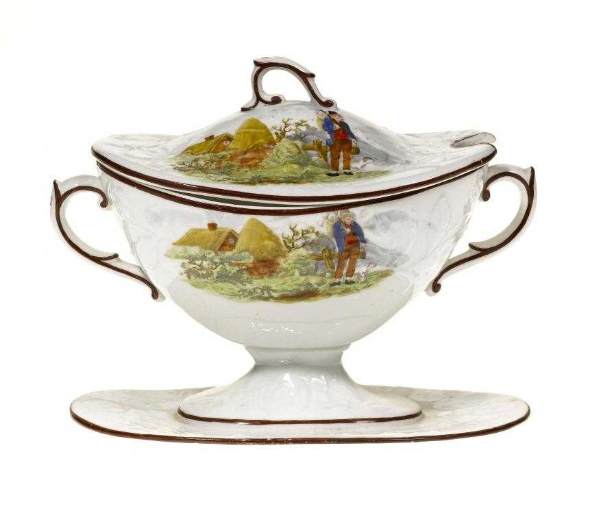 Appraisal: A STAFFORDSHIRE DESSERT TUREEN AND COVER moulded with trailing flower