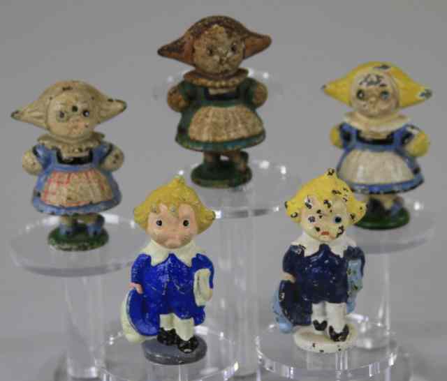 Appraisal: L BOBBY BLAKE DUTCH GIRL PAPERWEIGHTS Hubley Grace Drayton designed