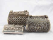 Appraisal: A mixed lot comprising three white metal handbags each approx