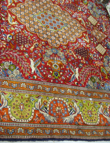 Appraisal: PERSIAN YAZD CARPET central flower-filled medallion and surrounding flowers birds