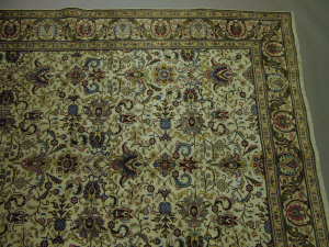 Appraisal: A Tabriz carpet with all over foliate and palm design