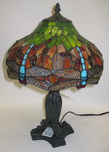 Appraisal: A STAINED AND LEADED GLASS TWO-LIGHT DESK LAMP in the