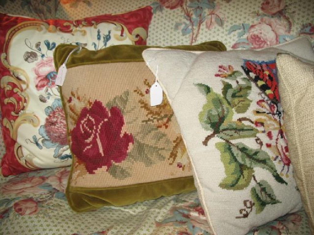 Appraisal: A COLLECTION OF NINE SCATTER CUSHIONS in chintz and floral