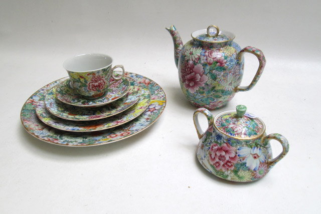 Appraisal: CHINESE FLORAL DINNER SERVICE consisting of seven dinner plates seven