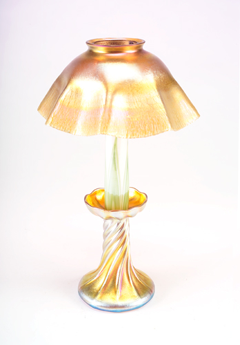 Appraisal: L C TIFFANY Gold Favrile glass candlestick lamp with ruffled