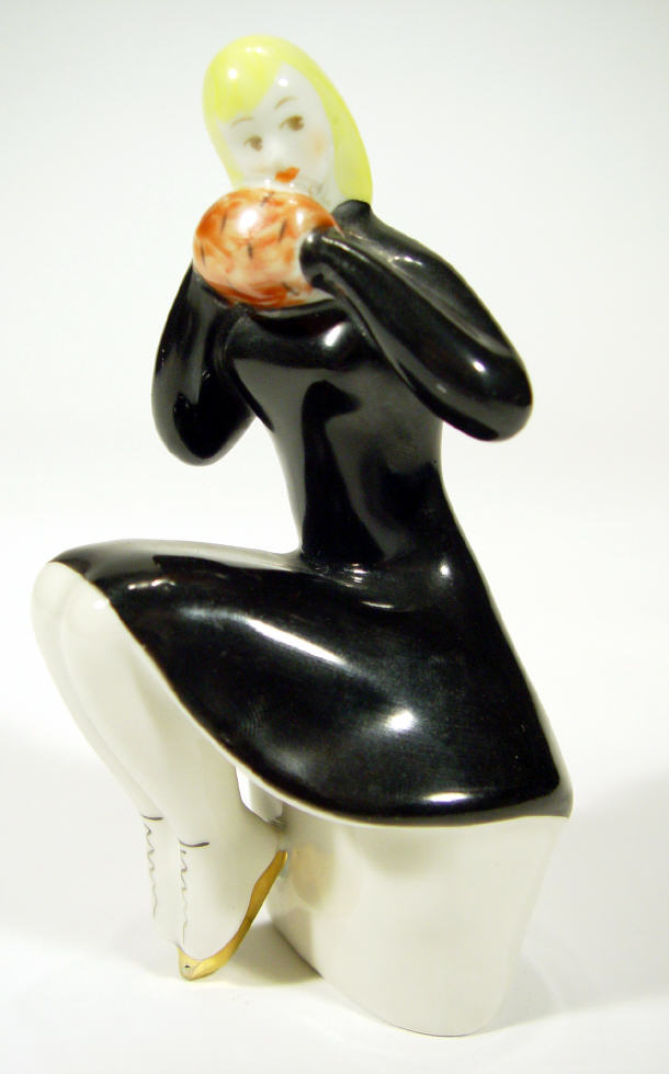 Appraisal: Hand painted USSR figurine a girl with hands in a