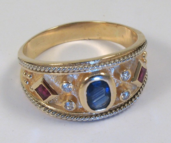 Appraisal: MAN'S SAPPHIRE RUBY AND DIAMOND RING k yellow gold set