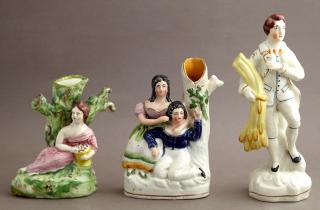 Appraisal: Three Staffordshire Pieces th c consisting of a male figure