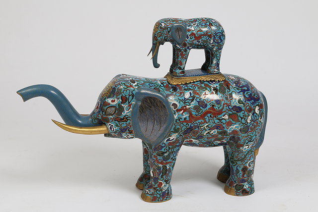 Appraisal: A CHINESE CLOISONNE BLUE GROUND ELEPHANT decorated with mythical creatures