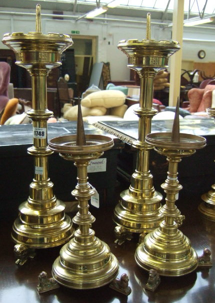 Appraisal: A pair of brass pricket candlesticks of gothic style th