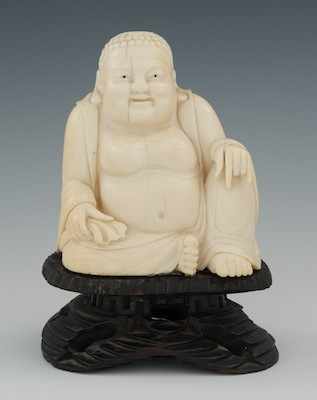 Appraisal: Carved Ivory Seated Buddha Carved ivory depicting a smiling Buddha