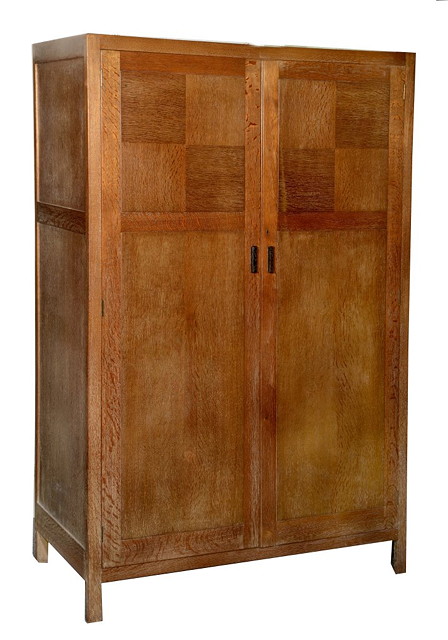 Appraisal: A HEALS CO OAK WARDROBE from the Russet Series enclosed