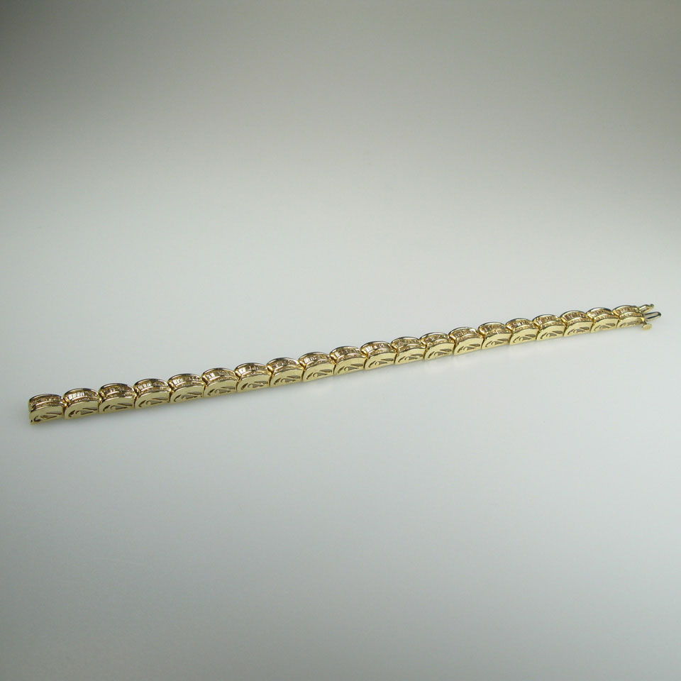 Appraisal: k Yellow Gold Bracelet channel set with baguette cut diamonds