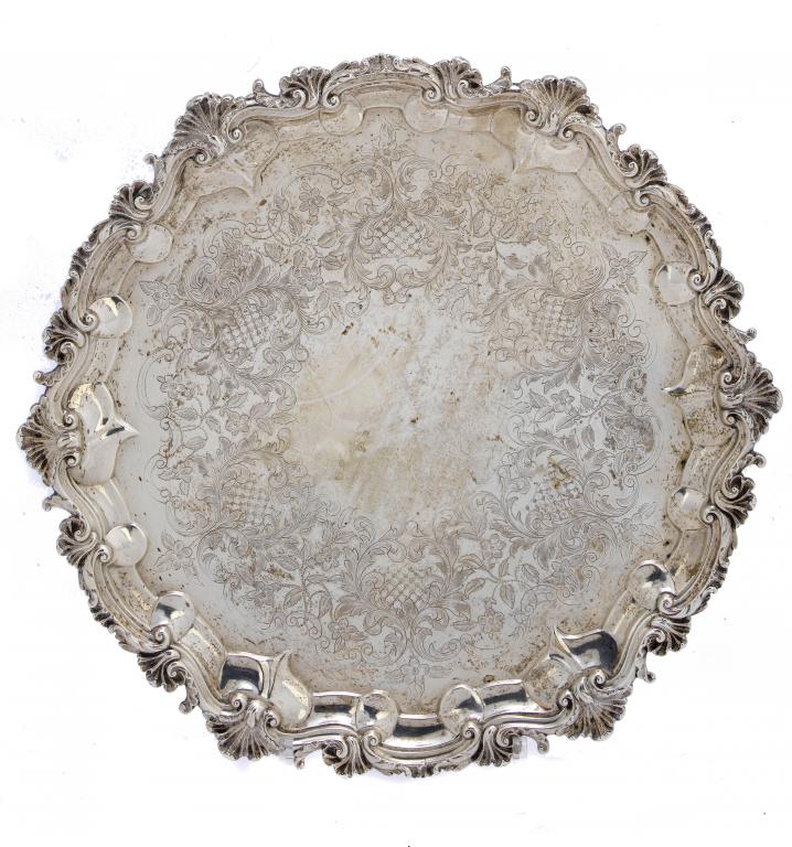 Appraisal: A VICTORIAN SALVER the field engraved with a wide band