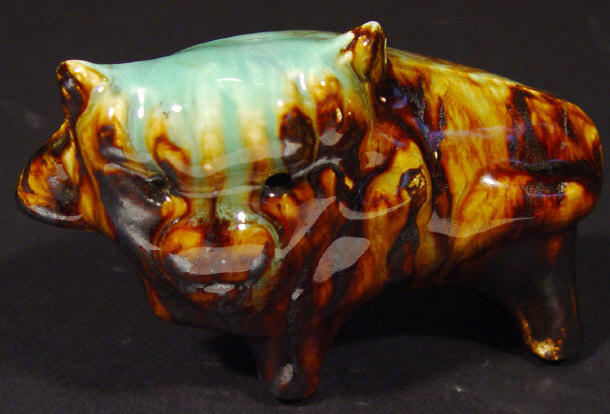 Appraisal: Eric Leaper pottery bull decorated in a green and brown