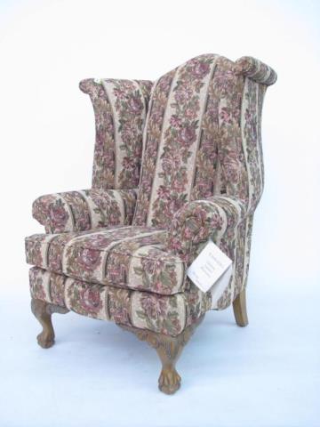 Appraisal: An upholstered Queen Anne style wing chair by Schnadig with